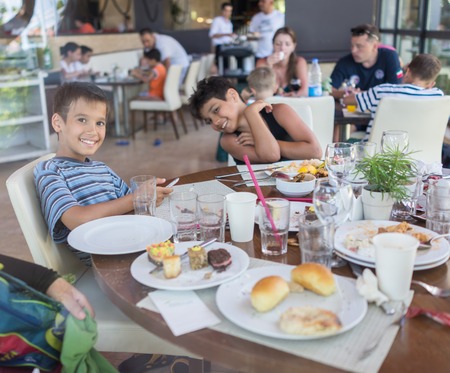 Kids in restaurantの写真素材