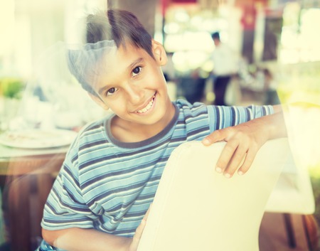 Kids in restaurantの写真素材