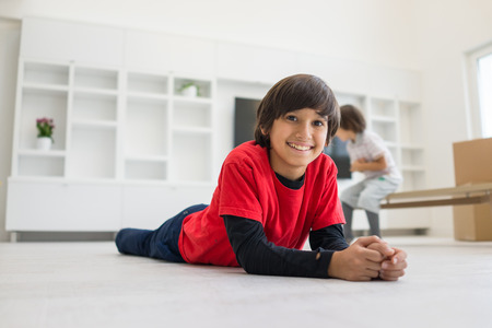 Children inside interior of modern homeの写真素材