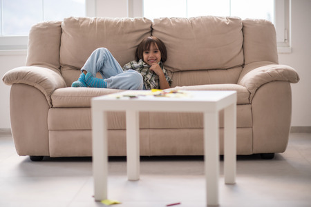 Cute little child at beautiful modern homeの写真素材