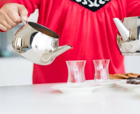 Enjoying in tea time at homeの写真素材