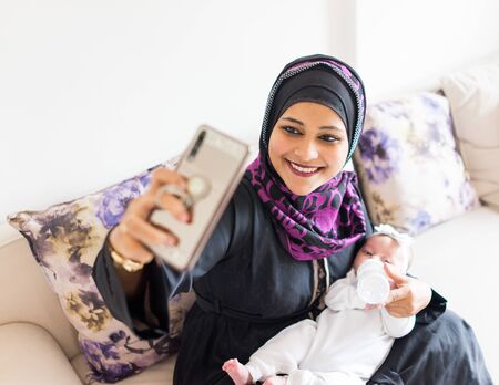 Muslim mother and babyの写真素材