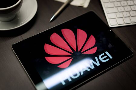 New York, New York / USA - 11 11 2019: Logo of Huawei on the iPad Air2 in on office deskのeditorial素材