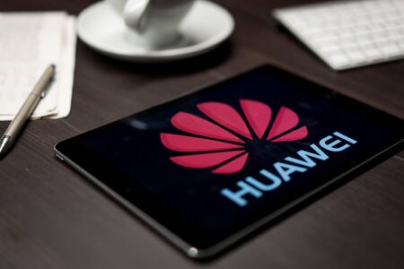New York, New York / USA - 11 11 2019: Logo of Huawei on the iPad Air2 in on office deskのeditorial素材