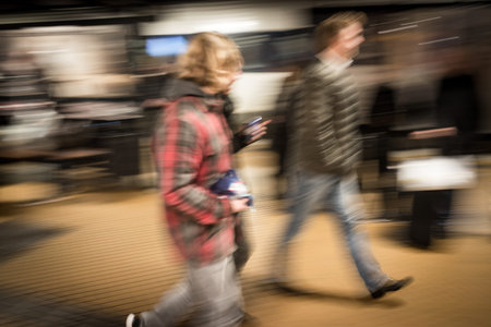 Train coming at downtown station in motion