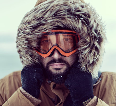 Winter man close up portrait , quality photo
