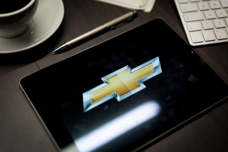 New York, New York / USA - 11 11 2019: Logo of Chevrolet on the iPad Air2 in on office deskのeditorial素材