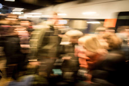 Train coming at downtown station in a motionの写真素材