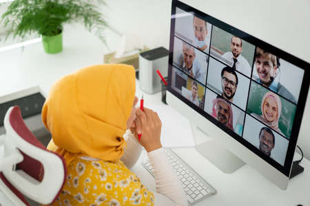 Middle Eastern businesswoman having the online conferenceの写真素材