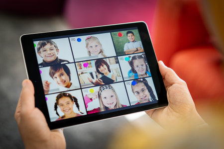 Distance learning school children online on the screenの写真素材