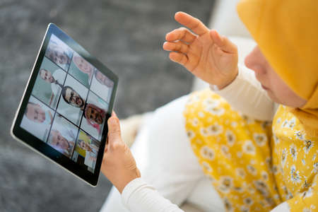 Middle Eastern businesswoman having the online conferenceの写真素材