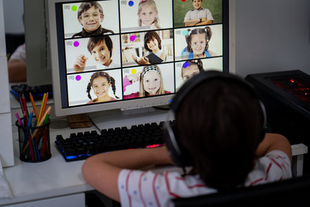 Little boy having online school distance learning class