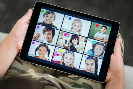 Little boy having online school distance learning classの写真素材