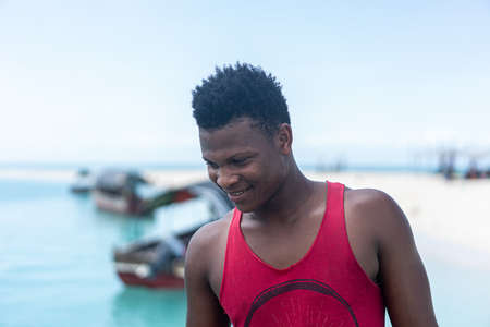Young black man working on the coastの写真素材