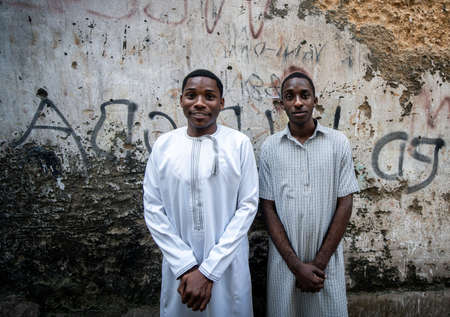 Two young black students standing out, high pictureの写真素材