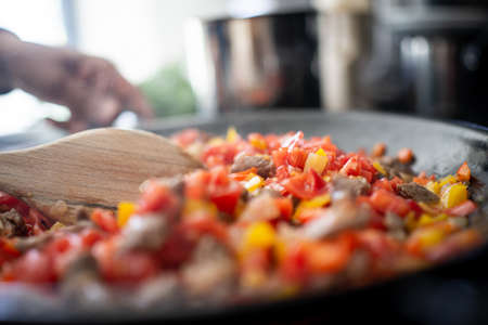 Preparing delicious food at home close upの写真素材