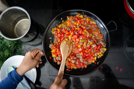 Preparing delicious food at home close upの写真素材