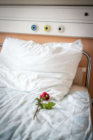 Little cute boy in hospital at bed indoorsの写真素材