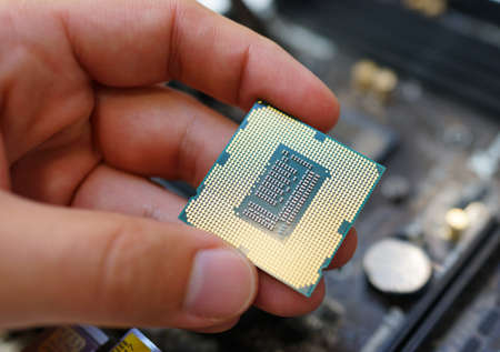 Working on the motherboard and pc processorの写真素材