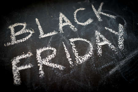 Black friday text on black chalk boardの写真素材