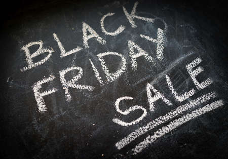 Black friday text on black chalk boardの写真素材