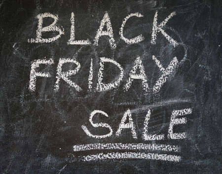 Black friday text on black chalk boardの写真素材
