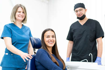 Two doctors with patient indoors ,high quality photoの写真素材