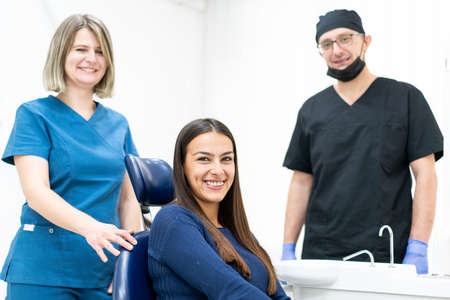 Two doctors with patient indoors ,high quality photoの写真素材