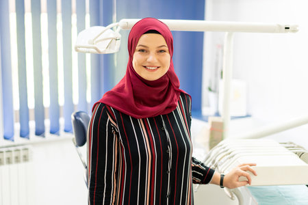 Muslim Middle Eastern girl inside dentist officeの写真素材