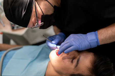 Visiting friendly and professional dentist. High quality photoの写真素材