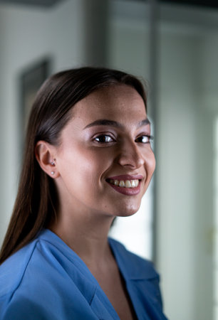 Beautiful young woman with mask inside hospital, high quality photoの写真素材