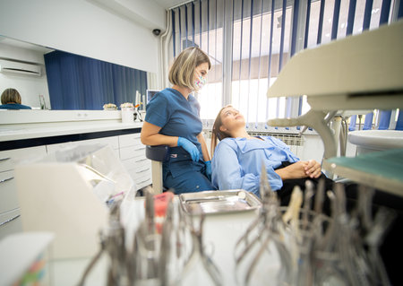 Visiting friendly and professional dentist , high photoの写真素材
