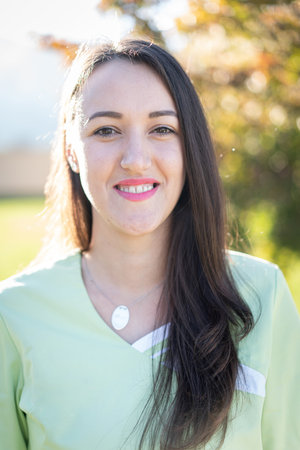 Portrait of the nurse with green uniform outdoorsの写真素材