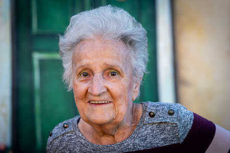 Aged candid woman close up portrait , high photoの写真素材