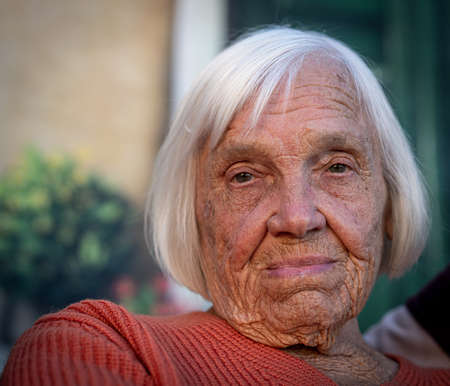 Aged candid woman close up portrait , high photoの写真素材