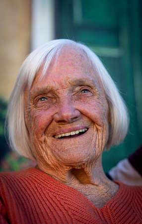 Aged candid woman close up portrait , high photoの写真素材