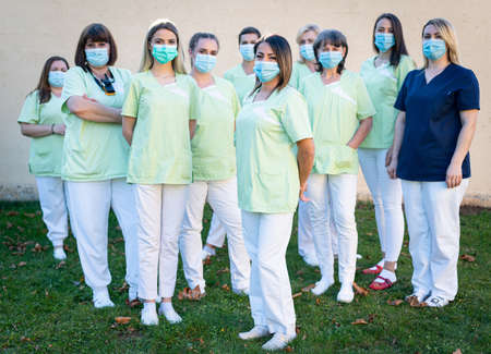 Nursing female team together portrait out side . high quality photoの写真素材