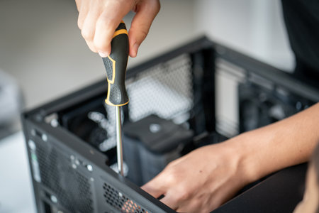 Repair of the computer system unit in the service center. High quality photoの写真素材