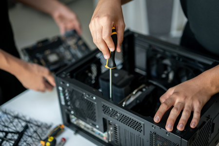 Repair of the computer system unit in the service center. High quality photoの写真素材