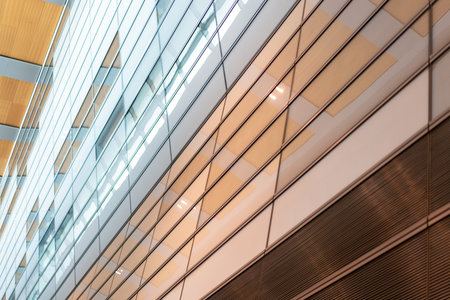 Modern building facade pattern with reflecting in windows. High quality photo