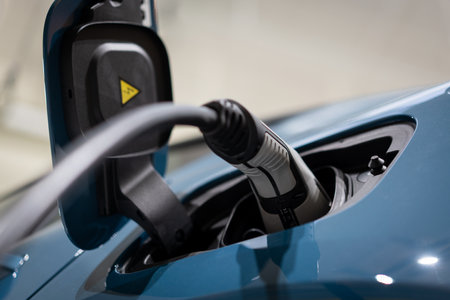 Power supply connect to electric vehicle for charge to the battery. . EV fuel Plug in hybrid car.の写真素材