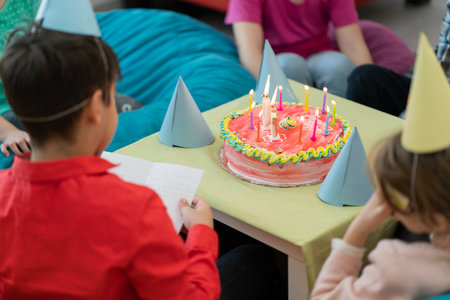 birthday cake, children joy at his homeの写真素材
