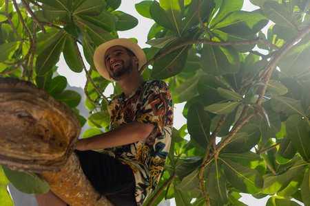Man laying on tree., nusa penida, bali. High quality photo