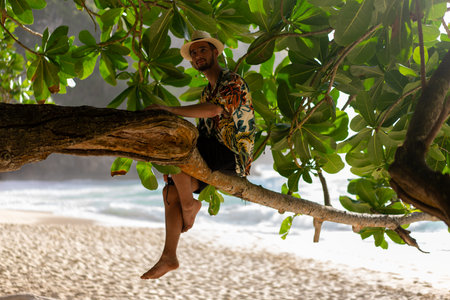 Man laying on tree., nusa penida, bali. High quality photoの写真素材