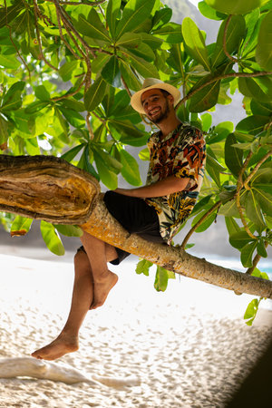 Man laying on tree., nusa penida, bali. High quality photoの写真素材