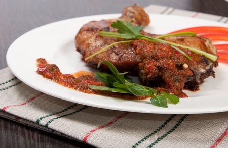 Tasty grilled chicken with pepper sauceの写真素材