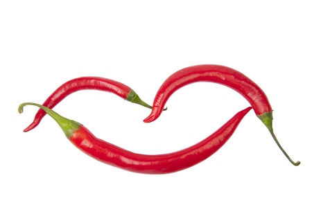 Red hot peppers isolated on whiteの写真素材