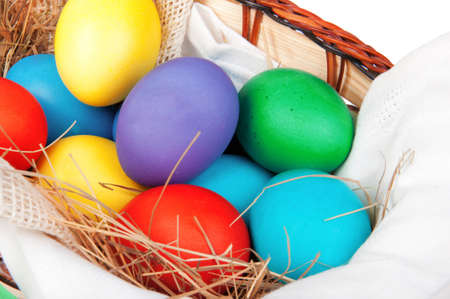 easter eggs in basket with bow の写真素材