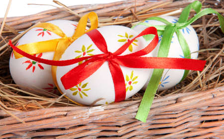 Colorful easter eggs with ribbonsの写真素材