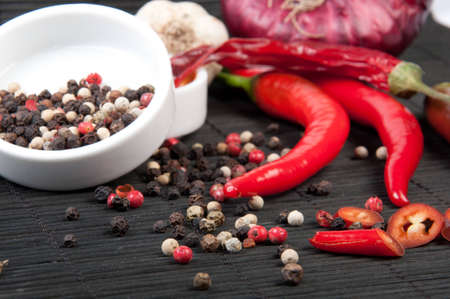 Different spices on a wooden tableの写真素材
